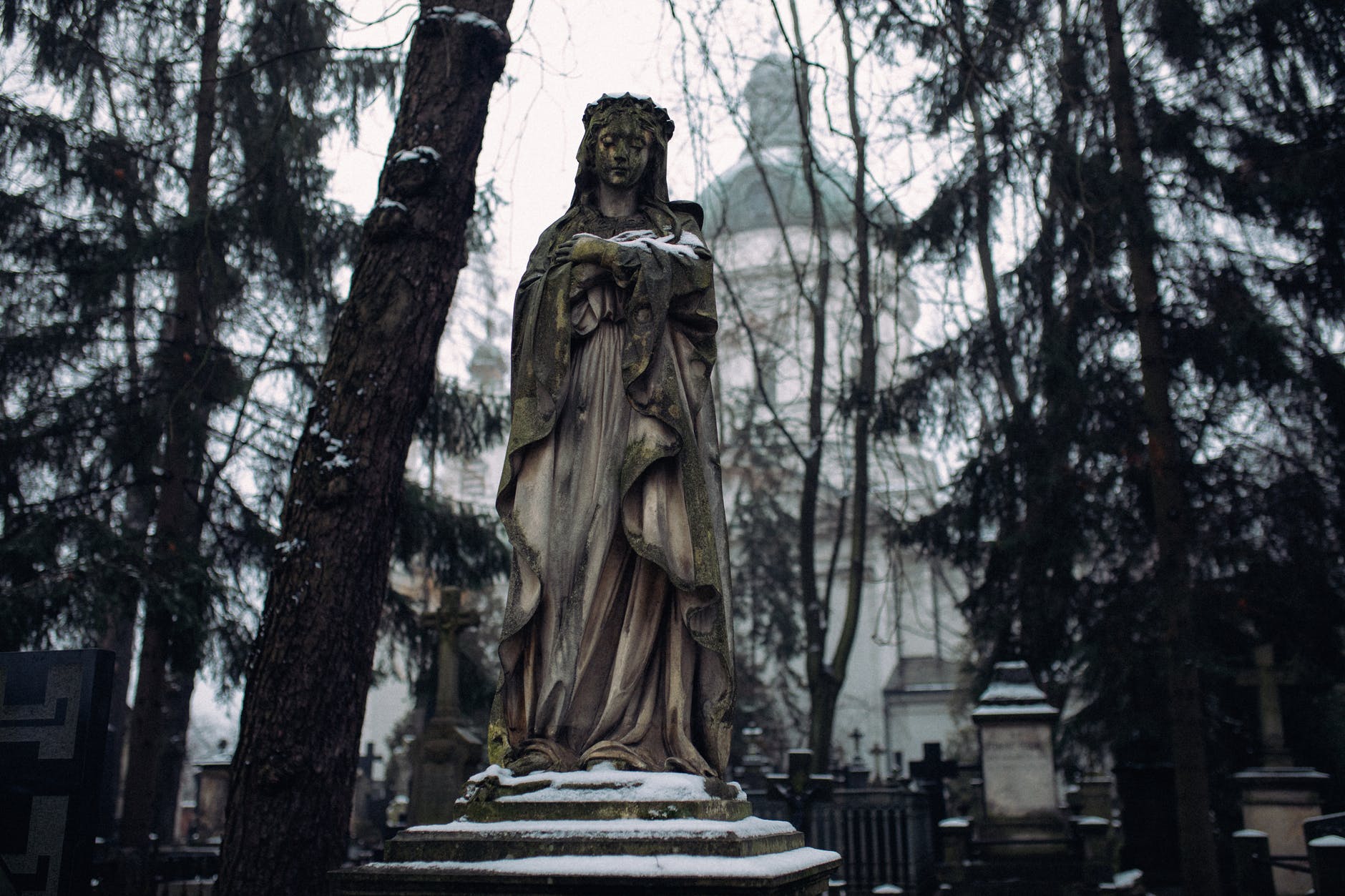a statue inside a cemetery